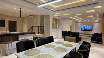 Family Apartment, Balcony, City View | Dining room