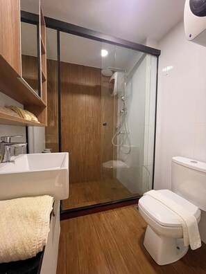 Hair dryer, towels, soap, toilet paper