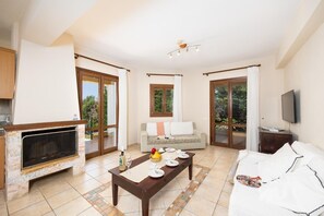 TV, fireplace - Ionian Blue - Three Bedroom Villa, Sleeps 7 (Svoronata)