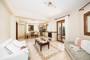 TV, fireplace - Ionian Blue - Three Bedroom Villa, Sleeps 7 (Svoronata)