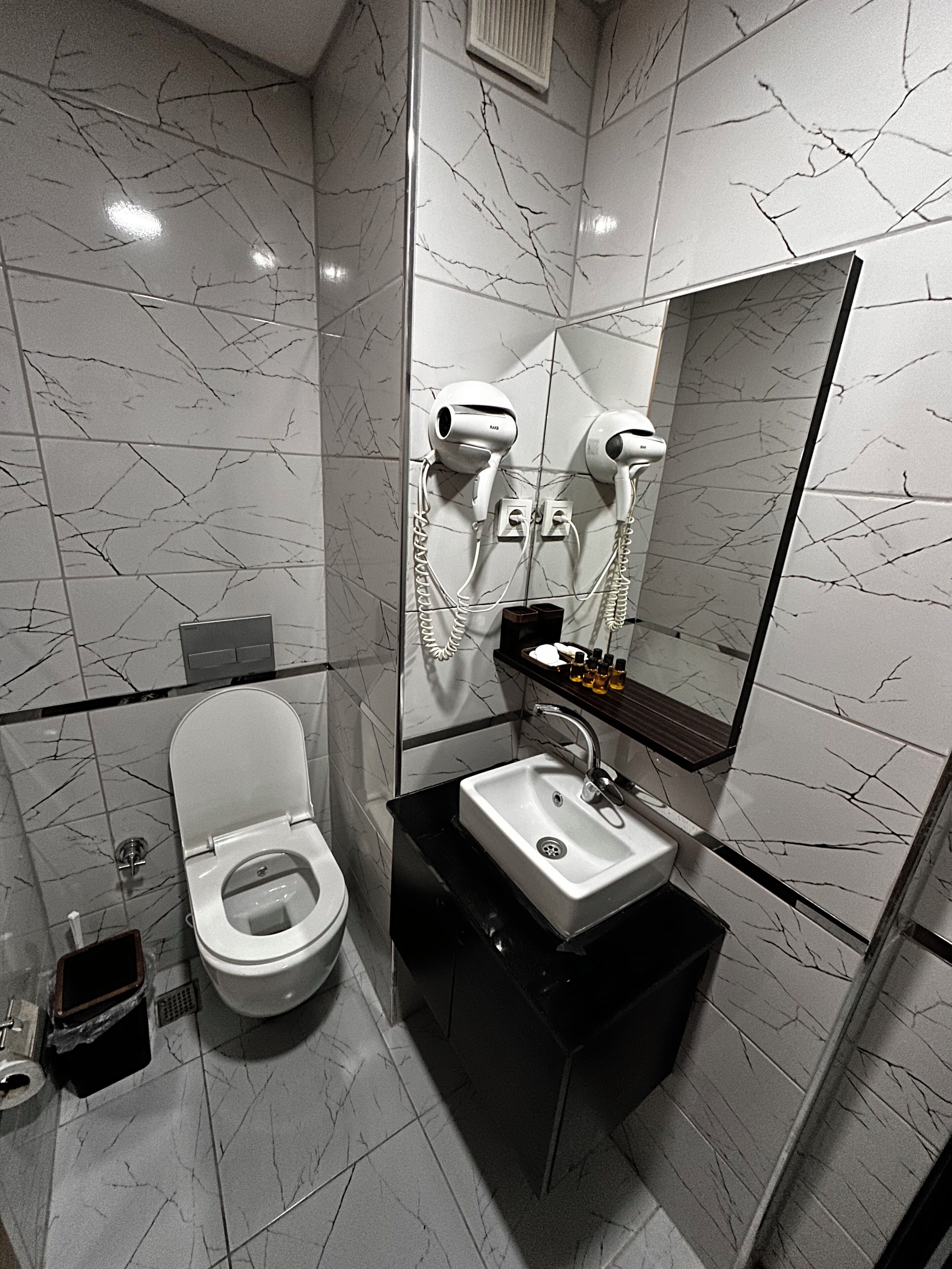 Economy Triple Room | Bathroom | Shower, hair dryer, towels, soap