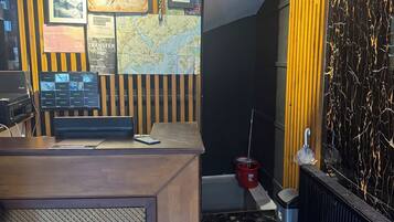 32-inch flat-screen TV with satellite channels, fireplace