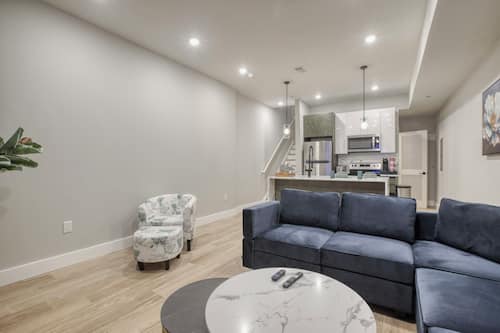 Deluxe Suite | Living area | 55-inch flat-screen TV with digital channels, streaming services