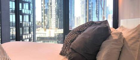 1 bedroom, desk, iron/ironing board, travel crib