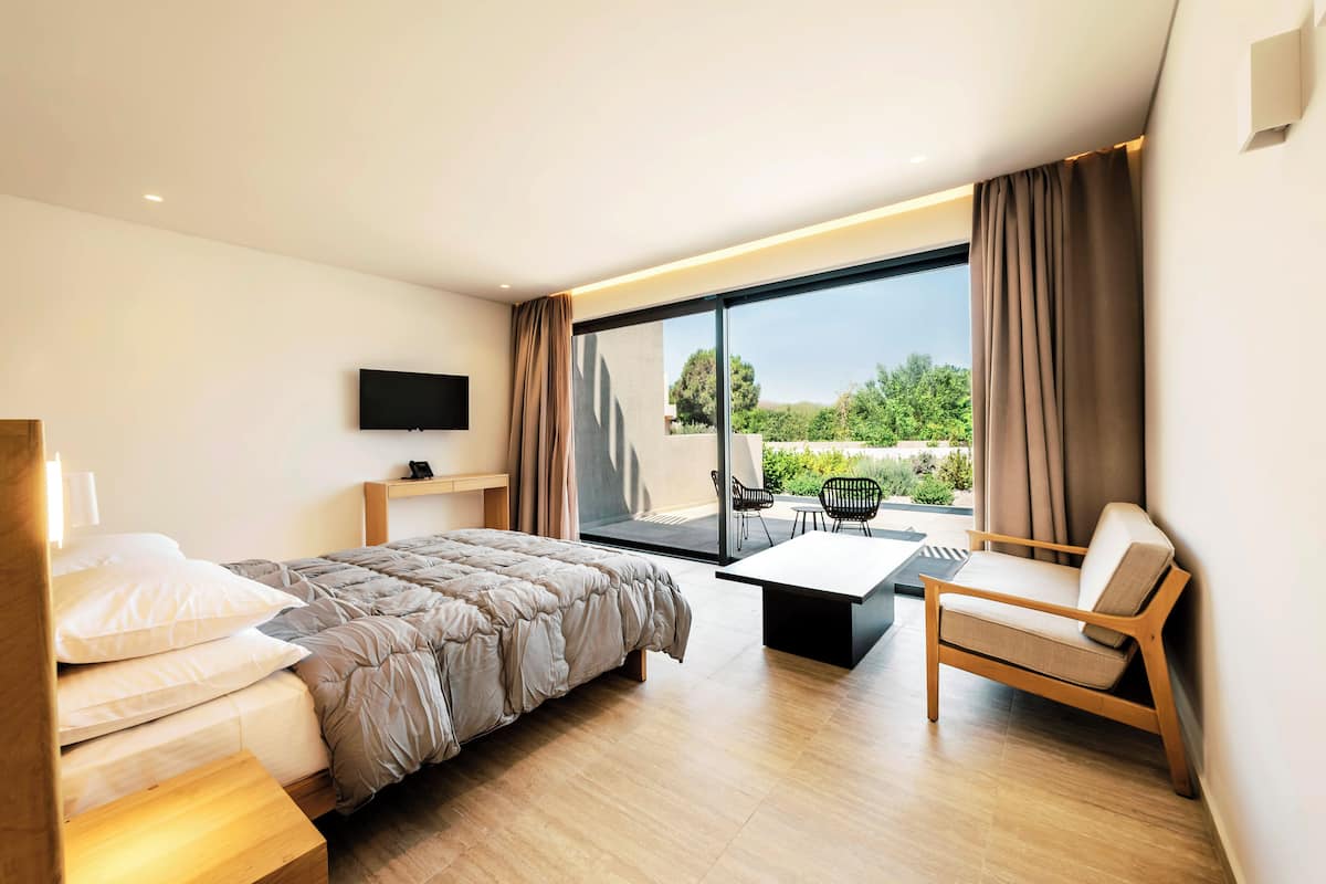 Suite, uitzicht op tuin | 2 slaapkamers, geluiddichte muren, gratis wifi