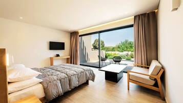 Suite, pemandangan kebun | 2 kamar tidur, kedap suara, dan Wi-Fi gratis
