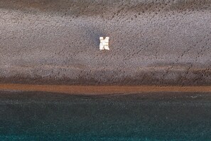 On the beach, free beach cabanas, sun-loungers, beach umbrellas