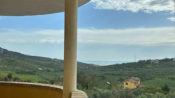 Deluxe Triple Room, Balcony, Beach View | Terrace/patio