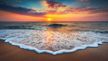 Espreguiçadeiras, toalhas de praia