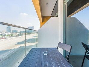 Deluxe Studio, City View | Balcony - Relaxing Studio Retreat in Vibrant Meydan City, (Dubai)