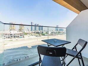 Deluxe Studio, City View | Balcony