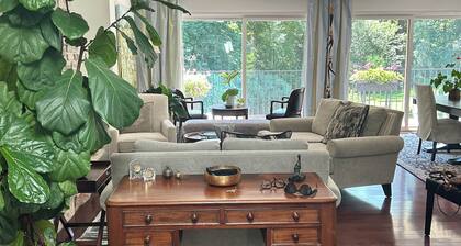 Designer 3-bedroom home near downtown in park like setting