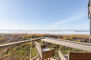 Upstairs balcony with comfortable seating and ocean front views