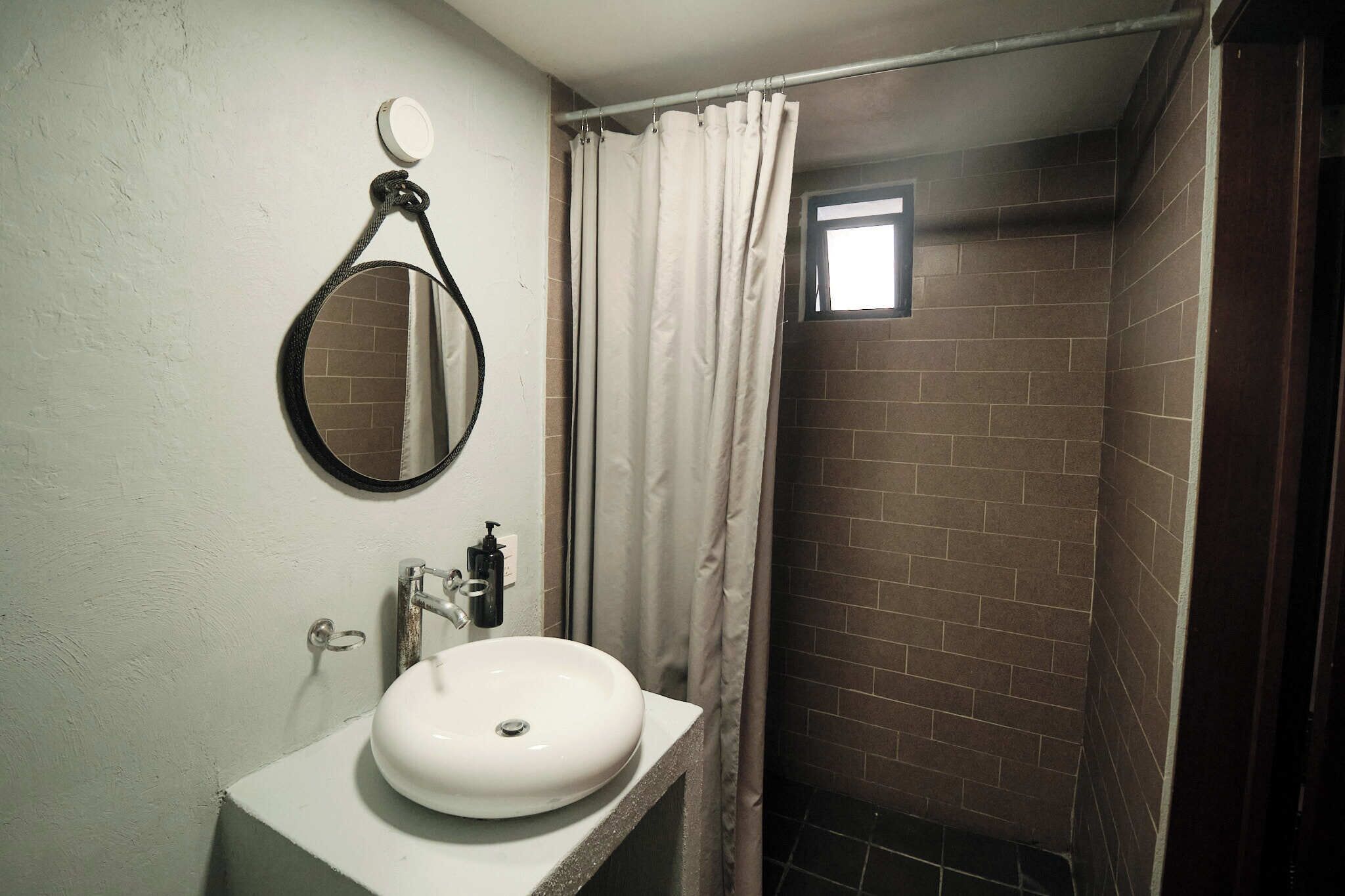 Shower, towels, toilet paper