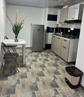 Private kitchen - 5 minutes from the main park! Studio apartment ideal for small families (Choachí)