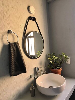 Shower, towels, toilet paper