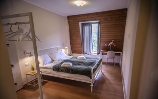 Premium bedding, down comforters, desk, laptop workspace