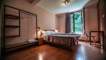 Premium bedding, down comforters, desk, laptop workspace