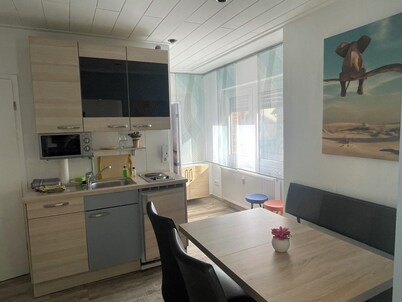 Centrally located in Leverkusen, modern furnished chic city apartment with service