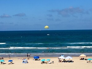 On the beach, sun-loungers, beach towels