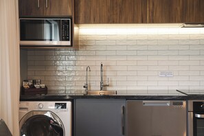 Fridge, microwave, oven, stovetop - The Residence Apartment Three (New Plymouth)