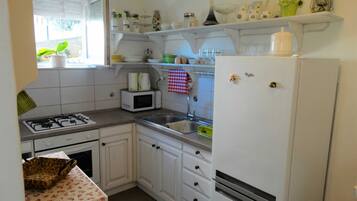Apartment (Classic Two Bedroom Apartment with Te) | Private kitchen | Fridge