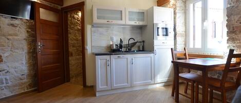 Fridge, stovetop, dishwasher, cookware/dishes/utensils