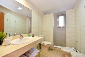 Shower, free toiletries, towels, soap