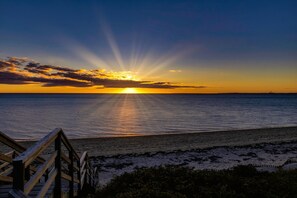 On the beach, sun loungers, beach towels