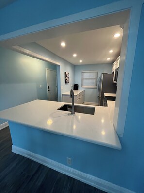 Private kitchen - Beautiful Oceanfront Corner Unit with panoramic views completely remodeled.  (Jensen Beach)