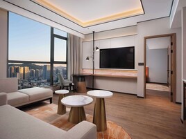 Suite, 1 Bedroom | Living area | TV