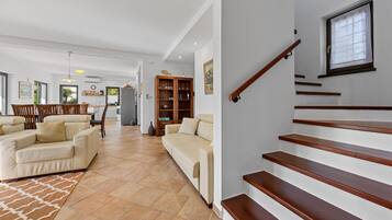 Villa | Living area | Fireplace, DVD player