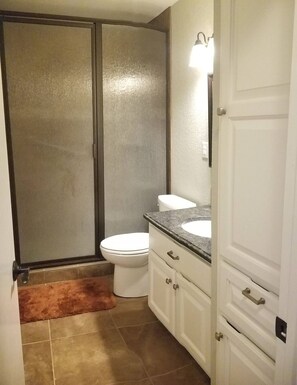 Shower, hair dryer, towels, soap