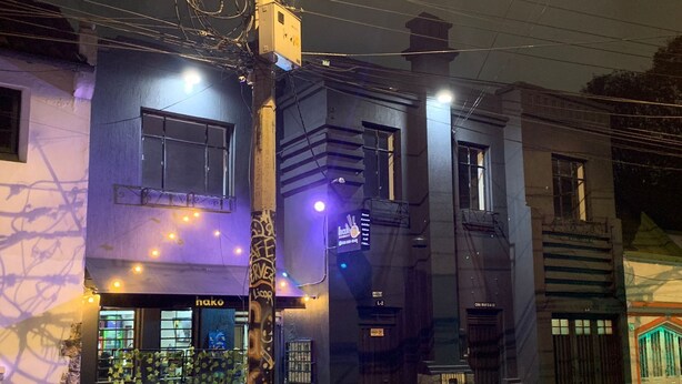 A building with multiple windows and a visible storefront. - Casa Fortel, Centro Internacional (Bogotá)