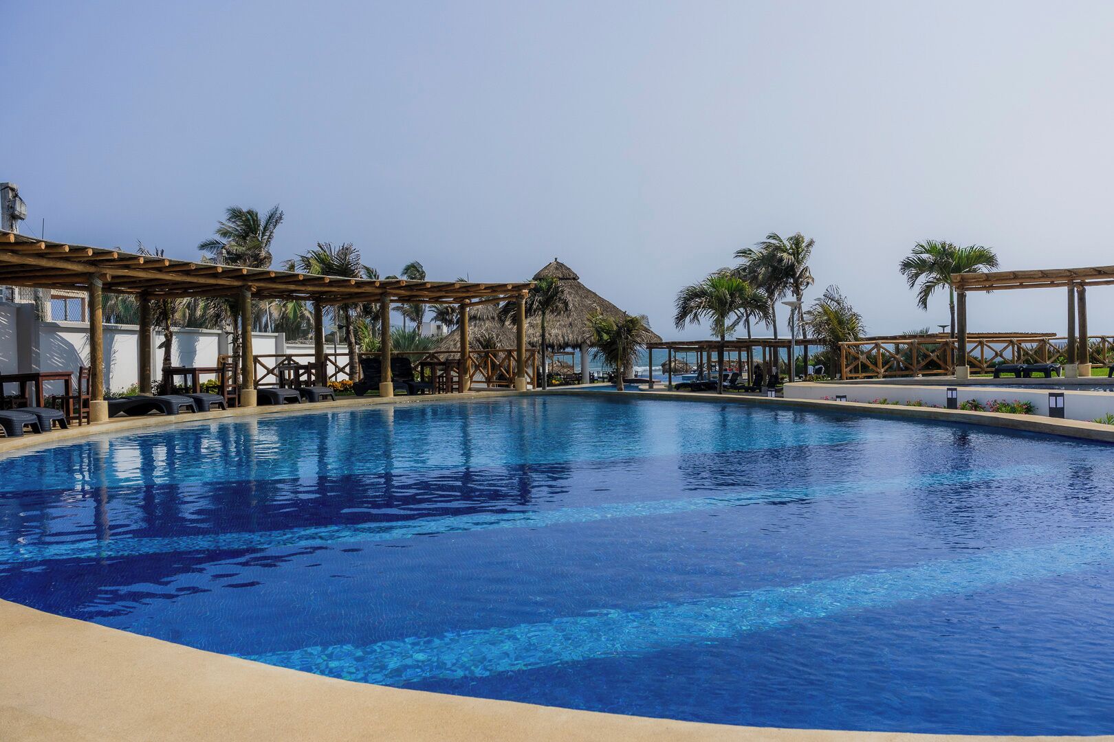 Outdoor pool, pool umbrellas, pool loungers