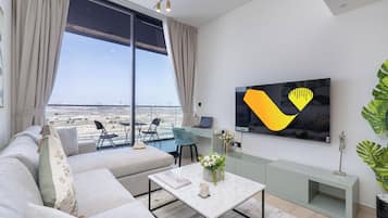 Appartement Luxe, balcon | Coin séjour