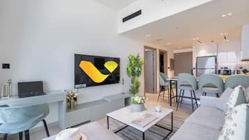 Appartement Luxe, balcon | Coin séjour