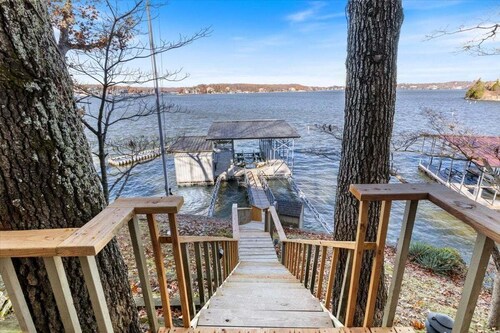 Cozy Digs Lake Lodge w/ 2 Decks, Game Room, Private Dock, Kayak, & Boat Slip
