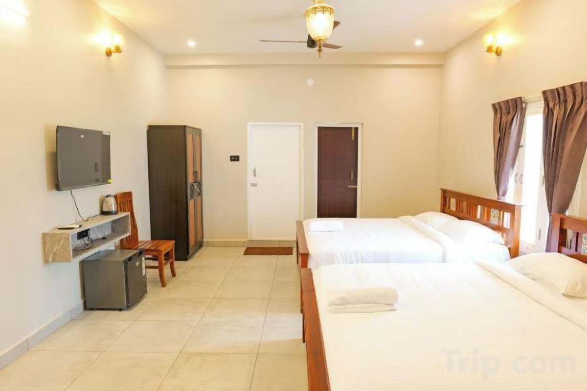 Premium bedding, desk, laptop workspace, soundproofing