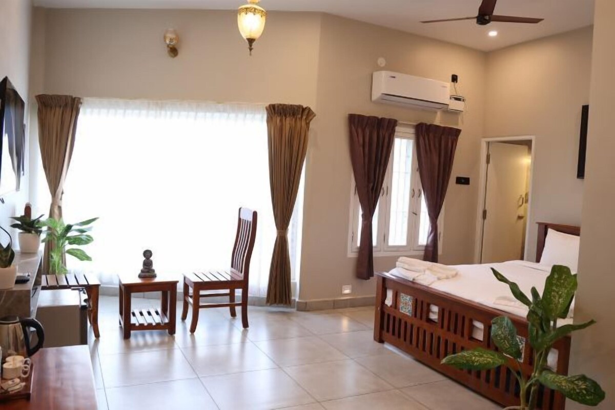 Premium bedding, desk, laptop workspace, soundproofing