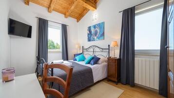 Vila | 2 quartos, individualmente mobiliados, ferros/tábuas de passar roupa