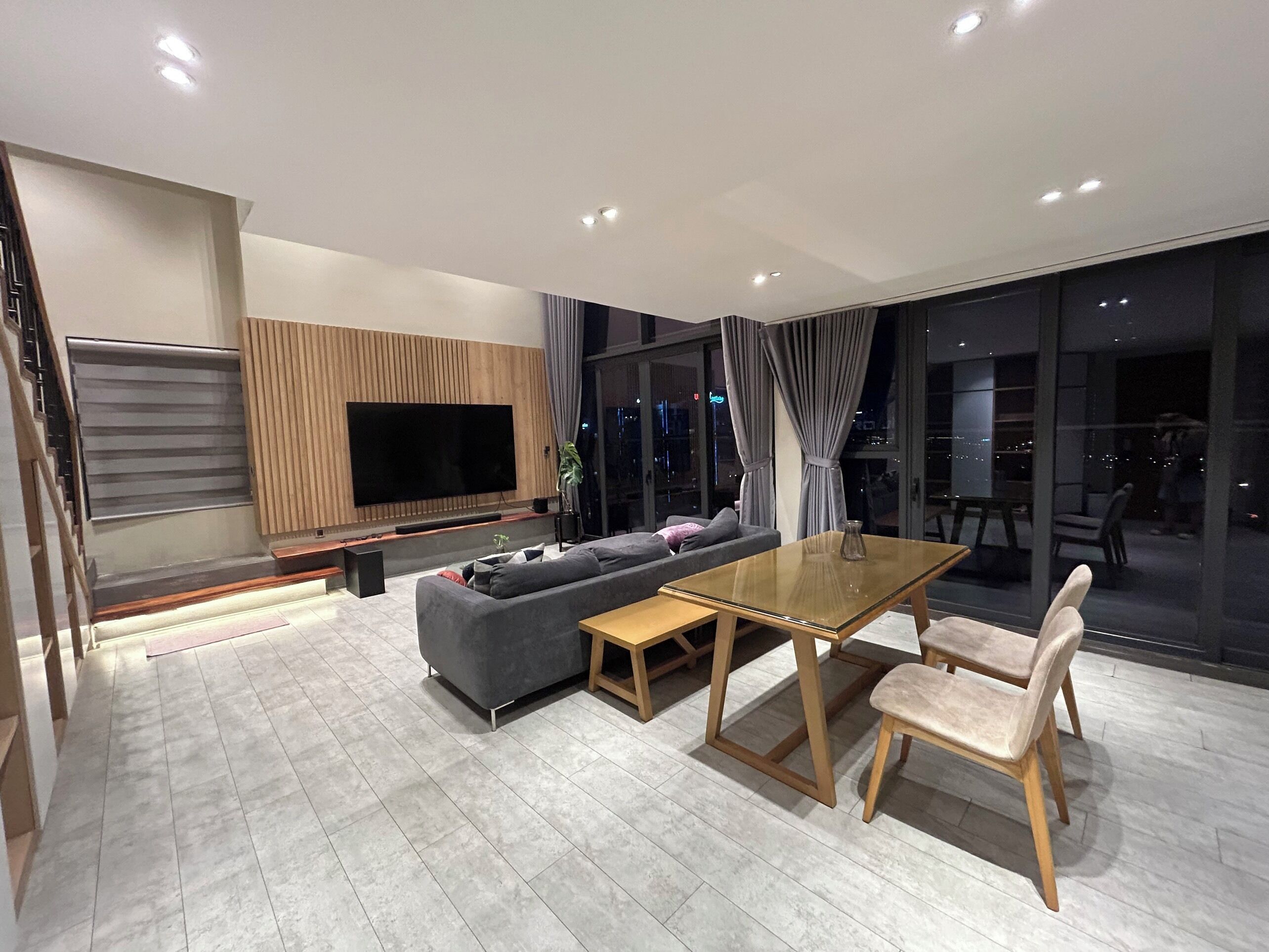 Deluxe Duplex, Balcony, City View | Living area | Flat-screen TV