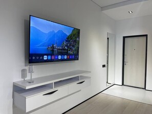 Family Studio Suite, Balcony, City View | Living area | 43-inch flat-screen TV with digital channels, TV - Akay city Golden studio (Tashkent)