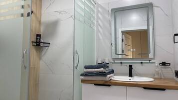 Family Studio Suite, Balcony, City View | Bathroom | Slippers