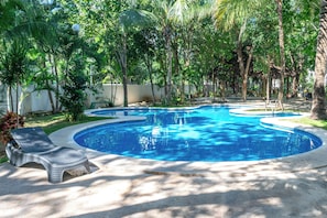 Outdoor pool, open 7:00 AM to 10:00 PM, pool umbrellas, pool loungers