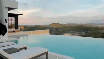 Outdoor pool, free pool cabanas, pool umbrellas