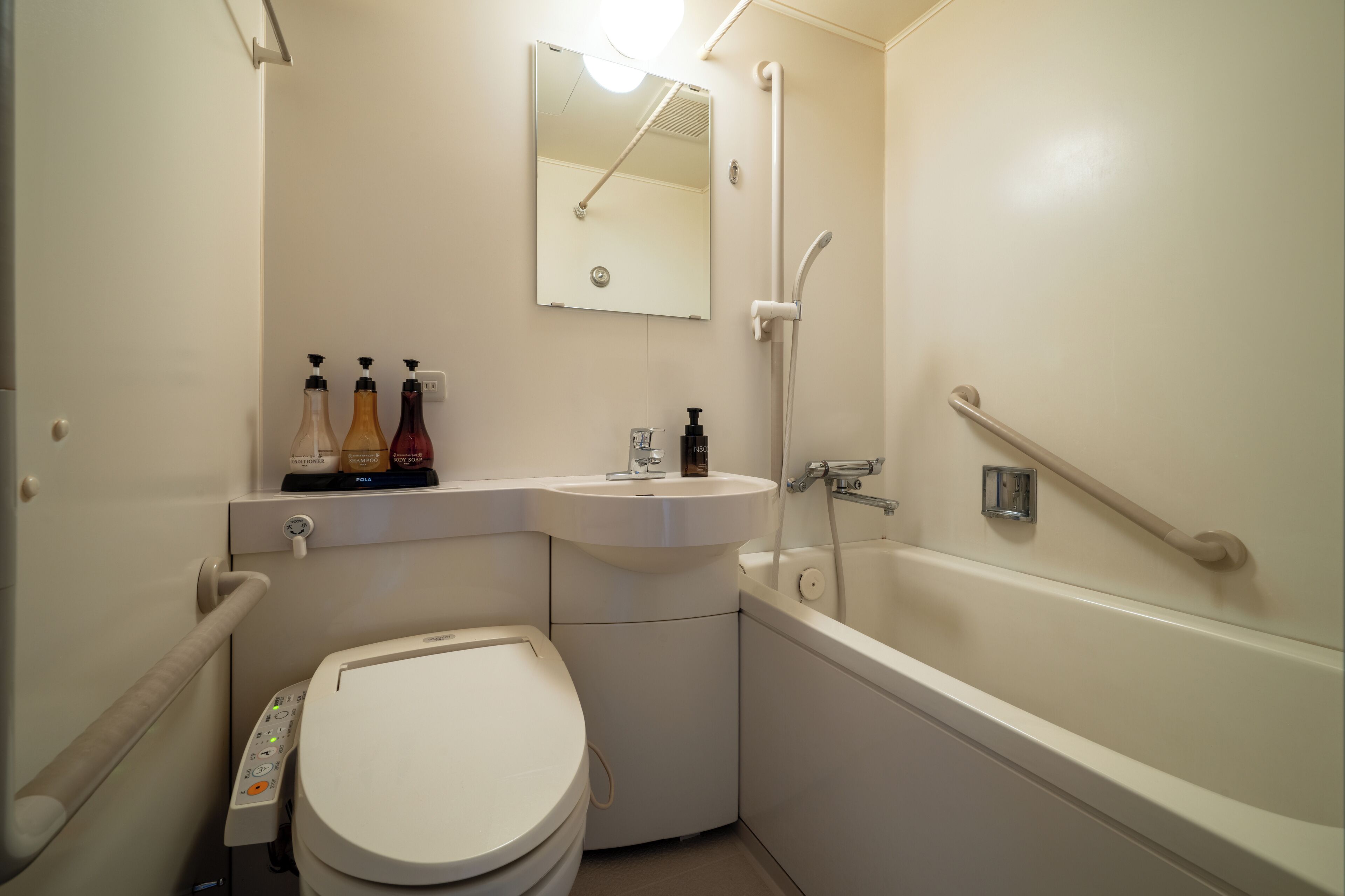 Hair dryer, slippers, towels, shampoo