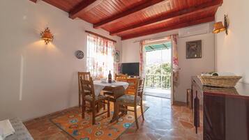 House (Two Bedroom Holiday Home) | Living room | 32-inch flat-screen TV with satellite channels