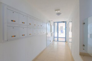 Guests can access their lockers and proceed through the secure entrance.