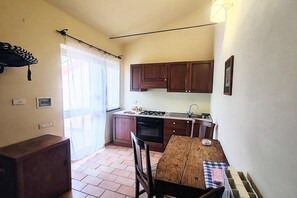 Fridge, stovetop, dining tables